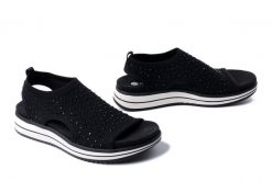 RIEKER REMONTE D1J55-00 black, sandały damskie. Czarne sandały Rieker Remonte, bez wzorów, bez obcasa, na koturnie, bez zapięcia. Za 349.90 zł.