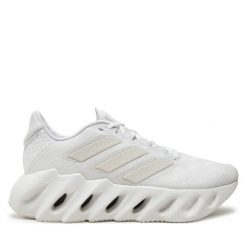 Buty do biegania adidas. Białe obuwie sportowe Adidas, bez zapięcia, do biegania. Za 649.99 zł.