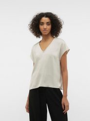 Vero Moda Koszulka w kolorze kremowym rozmiar: XS. Brązowe bluzki Vero Moda, xs, bez wzorów, z poliamidu, bez kołnierzyka, bez ramiączek. Za 35.35 zł.