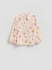 Bawełniana koszula w kwiaty - jasnoniebieski. Niebieskie koszule Reserved, l, bez wzorów, z bawełny, bez kołnierzyka, bez ramiączek. Za 129.99 zł.