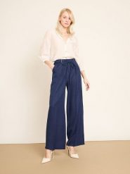 BGN Spodnie w kolorze granatowym rozmiar: 36. Niebieskie spodnie materiałowe BGN, na imprezę, bez wzorów, z materiału, z podwyższonym stanem. Za 154.07 zł.