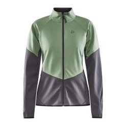 Damska wiatrówka Craft Glide. Zielone kurtki sportowe Craft, bez wzorów, z softshellu, bez kaptura, na fitness i siłownię. W wyprzedaży za 279.00 zł.