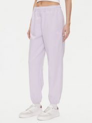 Calvin Klein Jeans Spodnie dresowe Monologo LV047B235G Fioletowy Regular Fit. Fioletowe spodnie dresowe Calvin Klein Jeans, xl, bez wzorów, z bawełny. Za 399.99 zł.