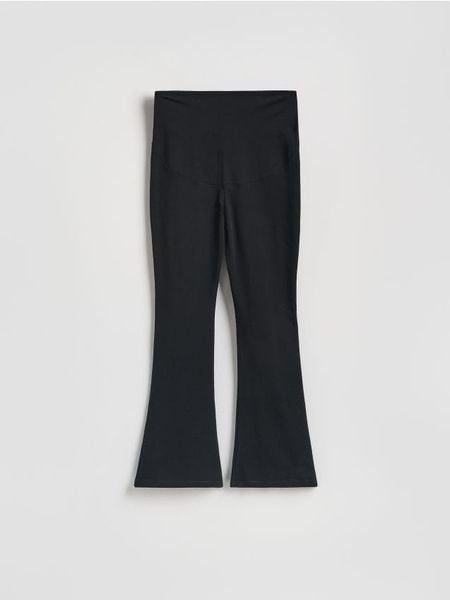 Legginsy flare - czarny. Czarne legginsy Reserved, l, bez wzorów, z bawełny. Za 89.99 zł.