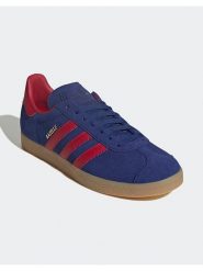 Adidas Skórzane sneakersy "Gazelle" w kolorze granatowym rozmiar: 39. Niebieskie trampki Adidas, bez wzorów, bez zapięcia. Za 292.61 zł.