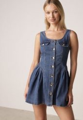 Niebieska Jeansowa Sukienka z Bawełny o Rozkloszowanym Kroju z Guzikami Nikesilea. Niebieskie sukienki Born2be, na spotkanie biznesowe, l, bez wzorów, z bawełny, eleganckie, bez kołnierzyka, bez ramiączek, mini, gorsetowe. Za 179.99 zł.