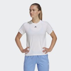 Koszulka treningowa damska adidas AEROREADY Essentials. Białe bluzki Adidas, l, bez wzorów, z materiału, sportowe, bez kołnierzyka, bez ramiączek. Za 126.70 zł.