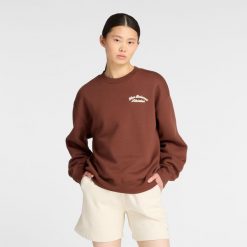Bluza damska New Balance WT53516ROK – brązowa. Brązowe bluzy New Balance, xl, bez wzorów, z bawełny, bez kaptura. Za 279.99 zł.
