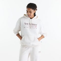 Bluza damska New Balance WT6288NOLIT - biała. Białe bluzy New Balance, m, bez wzorów, z bawełny, bez kaptura. Za 299.99 zł.