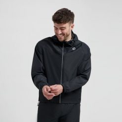 Kurtka przeciwdeszczowa Rogelli Commuter Core. Czarne kurtki sportowe Rogelli, m, bez wzorów, bez kaptura, rowerowe. Za 245.00 zł.