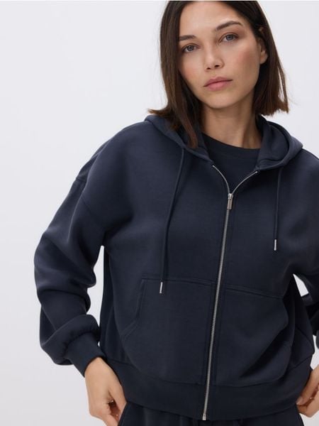 Oversizowa bluza - ciemnoszary. Szare bluzy Reserved, l, bez wzorów, z dzianiny, bez kaptura. W wyprzedaży za 65.99 zł.