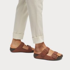 Skórzane sandały FitFlop Gogh. Brązowe sandały FIT FLOP, bez wzorów, ze skóry, eleganckie, bez obcasa, bez zapięcia. Za 559.50 zł.