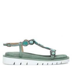 Sandały Eva Minge. Zielone sandały Eva Minge, bez wzorów, bez obcasa, na płaskiej podeszwie, bez zapięcia. Za 399.99 zł.