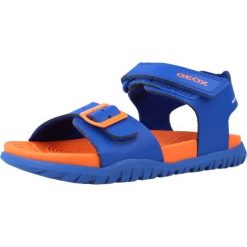 Sandały GEOX J SANDAL FUSBETTO BO Pomarańczowy. Brązowe sandały Geox, bez wzorów, ze skóry, bez obcasa, bez zapięcia. Za 259.60 zł.