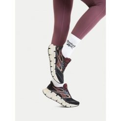 Buty do biegania Reebok. Czarne obuwie sportowe Reebok, bez zapięcia, do biegania. Za 489.99 zł.