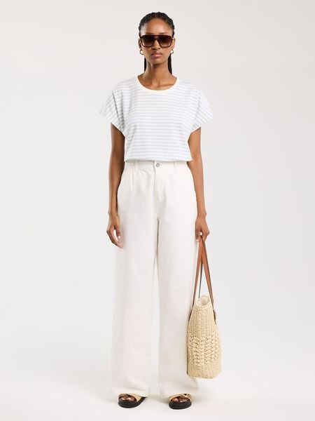 BIG STAR Koszulka w kolorze błękitno-białym rozmiar: S. Białe bluzki Big Star, s, bez wzorów, z bawełny, retro, bez kołnierzyka, bez ramiączek. Za 39.99 zł.