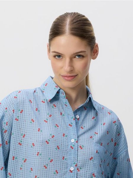 Wzorzysta koszula - jasnoniebieski. Niebieskie koszule Reserved, l, bez wzorów, z tkaniny, bez kołnierzyka, bez ramiączek. W wyprzedaży za 59.99 zł.