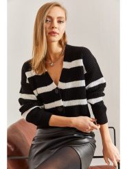 Bianco Lucci Kardigan w kolorze czarno-białym rozmiar: S. Czarne kardigany Bianco Lucci, s, bez wzorów, ze splotem. Za 65.99 zł.