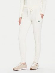 Guess Spodnie dzianinowe V5BB20 Z0572 Beżowy Regular Fit. Brązowe spodnie materiałowe Guess, m, z aplikacjami, z dzianiny. Za 439.99 zł.