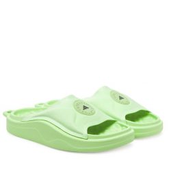 Klapki adidas. Żółte klapki Adidas, bez wzorów, bez obcasa. Za 279.99 zł.