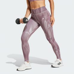 Legginsy Optime Full-Length Print. Czarne bielizna sportowa Adidas, m, bez wzorów, z materiału. W wyprzedaży za 253.10 zł.