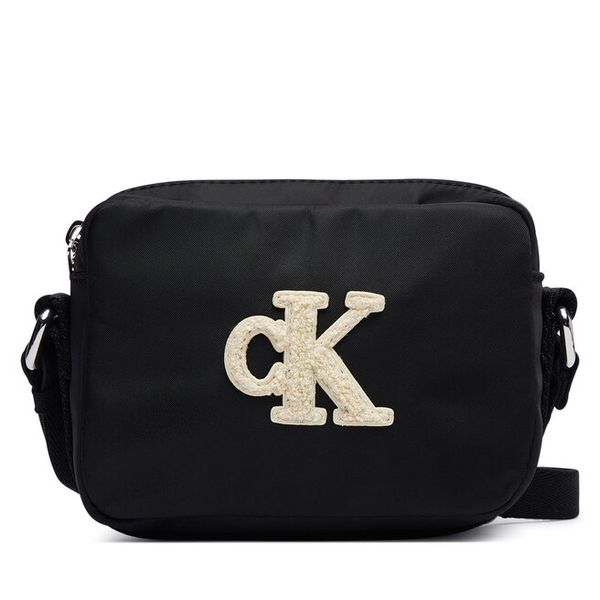 Torebka Calvin Klein Jeans. Czarne listonoszki Calvin Klein Jeans, bez wzorów, z jeansu, bez dodatków. Za 189.99 zł.