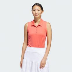 Koszulka Women's Ultimate365 Solid Sleeveless Polo. Czerwone koszulki polo Adidas, s, bez wzorów, z materiału, bez kołnierzyka, bez ramiączek. Za 165.50 zł.