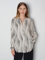 Someday Bluzka w kolorze beżowo-czarnym rozmiar: 38. Brązowe bluzki someday., bez wzorów, z wiskozy, bez kołnierzyka, bez ramiączek. Za 143.99 zł.