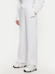 Tommy Hilfiger Spodnie dresowe UW0UW05577 Biały Relaxed Fit. Białe spodnie dresowe TOMMY HILFIGER, m, bez wzorów, z bawełny. Za 179.99 zł.