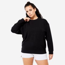 Bluza damska Domyos Gym & Pilates oversize. Czarne bluzy DOMYOS, xl, bez wzorów, z bawełny, bez kaptura. W wyprzedaży za 59.99 zł.