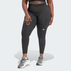 Legginsy Own the Run 7/8 (Plus Size). Czarne legginsy Adidas, plus size, bez wzorów, z materiału. Za 279.00 zł.
