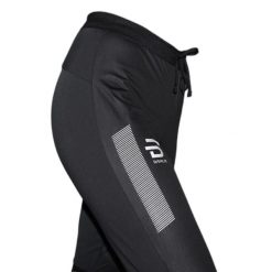 Damskie spodnie do biegania Daehlie Sportswear Winter Run. Czarne spodnie narciarskie DAEHLIE, l, bez wzorów, z elastanu, do biegania. Za 508.50 zł.