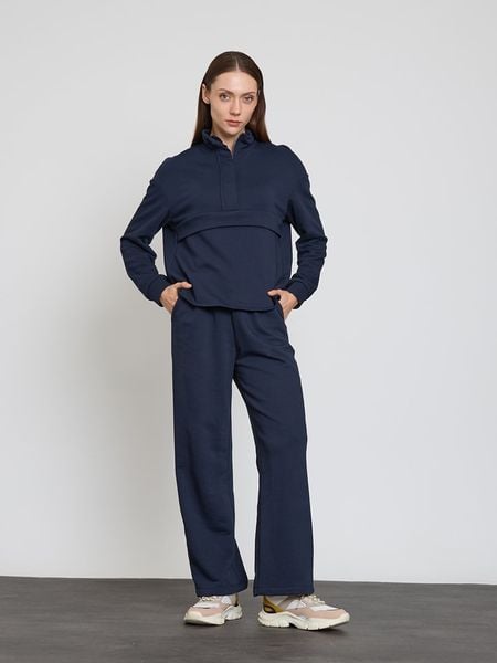 BGN Spodnie dresowe w kolorze granatowym rozmiar: 34. Niebieskie spodnie sportowe BGN, bez wzorów, z dresówki. Za 86.99 zł.