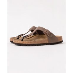 Japonki damskie Birkenstock Gizeh Birkoflor. Brązowe klapki Birkenstock, bez wzorów, z materiału, z otwartym noskiem, bez obcasa. Za 546.00 zł.