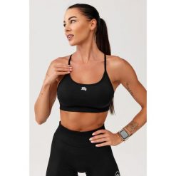 Stanik sportowy bezszwowy Rough Radical Seamless Glow Bra. Czarne bielizna sportowa ROUGH RADICAL, bez wzorów. W wyprzedaży za 103.92 zł.