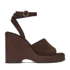 Sandały GINO ROSSI. Brązowe sandały Gino Rossi, bez wzorów, bez obcasa, na koturnie, bez zapięcia. Za 249.99 zł.