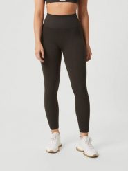 Bjorn_borg STUDIO SEAMLESS RIBBED TIGHTS bezszwowe prążkowane legginsy – PEAT. Brązowe legginsy Björn Borg, xs, bez wzorów, prążkowane. Za 307.50 zł.