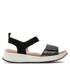 Sandały Caprice. Czarne sandały Caprice, bez wzorów, bez obcasa, na płaskiej podeszwie, bez zapięcia. Za 229.99 zł.