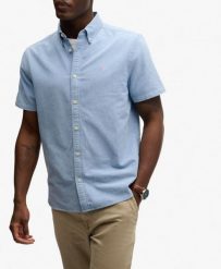 Superdry Koszula Preppy Oxford krótki rękaw Sky Blue Chambray. Niebieskie koszule Superdry, uniwersalny, bez wzorów, z bawełny, eleganckie, bez kołnierzyka, bez ramiączek. Za 282.95 zł.