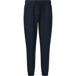 Damskie spodnie dresowe Athlecia Austberg. Niebieskie spodnie dresowe ENDURANCE, bez wzorów, z dresówki. Za 251.50 zł.