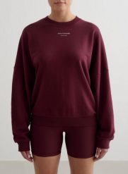 Damska bluza frotte, luźna, z okrągłym dekoltem Apparel Terry wiśniowa. Czerwone bluzy AIM'N, m, bez wzorów, z dzianiny, bez kaptura. Za 297.00 zł.