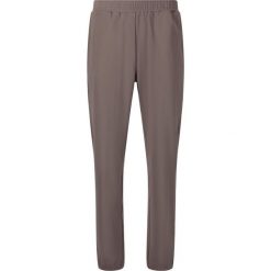Damskie spodnie dresowe Athlecia Guyana. Brązowe spodnie dresowe Athlecia, bez wzorów, z dresówki, na fitness i siłownię. Za 189.50 zł.