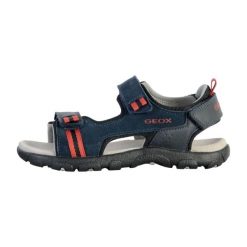 Sandały GEOX JR SANDAL STRADA A Niebieski. Niebieskie sandały Geox, bez wzorów, ze skóry, bez obcasa, bez zapięcia. Za 152.99 zł.