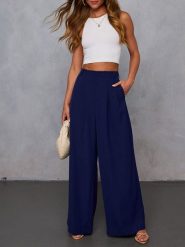 Milan Kiss Spodnie w kolorze granatowym rozmiar: S. Niebieskie spodnie materiałowe Milan Kiss, s, bez wzorów, z materiału, z podwyższonym stanem. Za 152.99 zł.