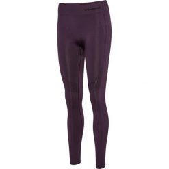 Damskie legginsy bezszwowe z wysokim stanem Hummel Shaping. Fioletowe legginsy Hummel, bez wzorów, z materiału, z podwyższonym stanem. Za 164.00 zł.
