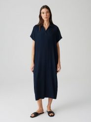 OPUS Sukienka w kolorze granatowym rozmiar: 36. Niebieskie sukienki Opus, bez wzorów, z bawełny, bez kołnierzyka, bez ramiączek, midi. Za 143.99 zł.