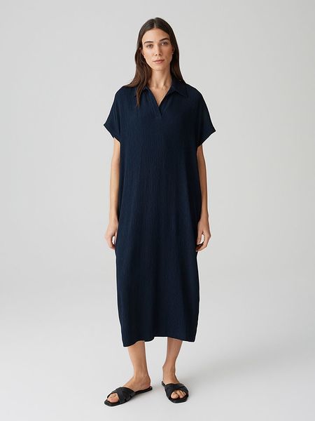 OPUS Sukienka w kolorze granatowym rozmiar: 34. Niebieskie sukienki Opus, bez wzorów, z bawełny, bez kołnierzyka, bez ramiączek, midi. Za 179.95 zł.