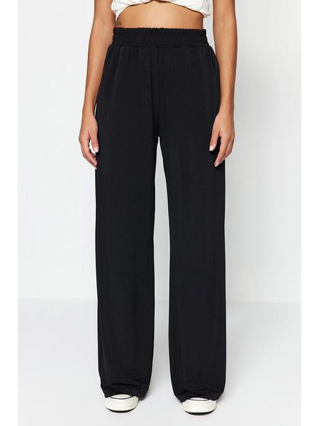 Trendyol Spodnie w kolorze czarnym rozmiar: M. Czarne spodnie materiałowe Trendyol, na imprezę, m, bez wzorów, z materiału, z podwyższonym stanem. Za 61.17 zł.