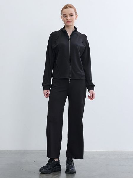 BGN Spodnie w kolorze czarnym rozmiar: 40. Czarne spodnie materiałowe BGN, na co dzień, bez wzorów, z materiału. Za 99.80 zł.