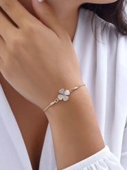 Luja Bijoux Pozłacana bransoletka z cyrkoniami i masą perłową rozmiar: onesize. Białe bransoletki Luja Bijoux, z cyrkonią, pozłacane. Za 87.81 zł.